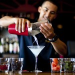 Joey pouring martini